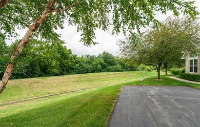 Meticulously maintained, this charming one-level villa offers a