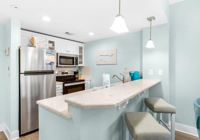 Located in the heart of Baytowne Wharf, this turnkey 5th-floor - photo 5