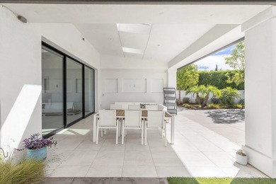 This spectacular Spanish Contemporary estate offers 7,016 SF of - photo 37