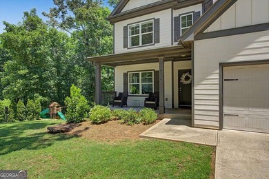 Nestled on a wooded 0.85 acre lot, this like new 4 bedroom, 2.5 - photo 2