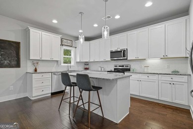 Nestled on a wooded 0.85 acre lot, this like new 4 bedroom, 2.5 - photo 6