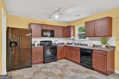 This charming 4-bedroom, 2.5-bath residence offers the ideal - photo 7