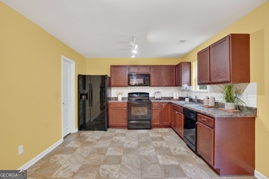 This charming 4-bedroom, 2.5-bath residence offers the ideal - photo 8