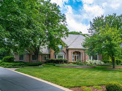 Nestled among mature trees and professionally landscaped grounds - photo 1