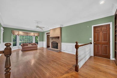 Nestled among mature trees and professionally landscaped grounds - photo 6