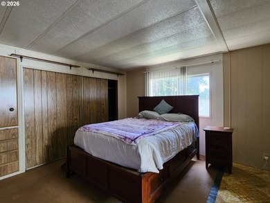 Tucked away on a private road in a charming coastal Oregon town - photo 15