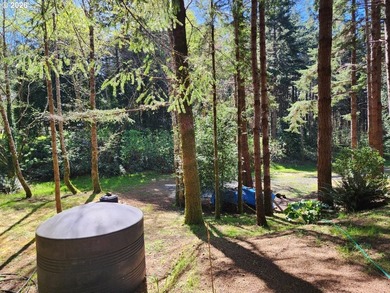 Tucked away on a private road in a charming coastal Oregon town - photo 36