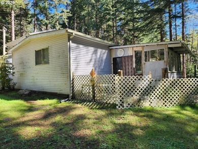 Tucked away on a private road in a charming coastal Oregon town - photo 37