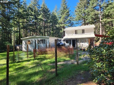 Tucked away on a private road in a charming coastal Oregon town - photo 41