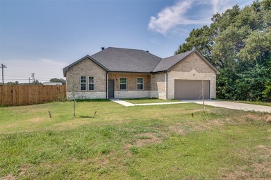 Welcome to this stunning new construction home featuring an open - photo 3
