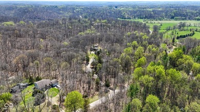 Did you say roughly 23 acres of heavily wooded ground currently - photo 6