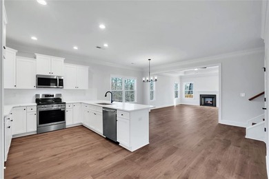 Welcome Home! This brand-new 4-bedroom, 3.5-bath home, expertly - photo 4
