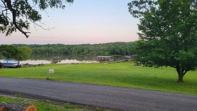 Escape to lake life with this charming retreat just seconds from - photo 13