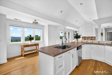Two distinct homes. One extraordinary address. Both equal in - photo 32