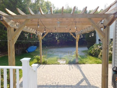 Custom built Cape that's hidden on 5.56 acres! Long driveway for - photo 32