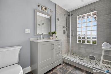 Two distinct homes. One extraordinary address. Both equal in - photo 34