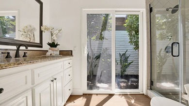Set on a beautiful greenbelt with mature landscaping and - photo 14