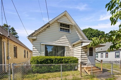 This updated cape cod style home offers comfort and modern charm - photo 1