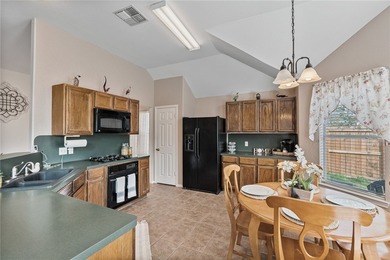 This charming 3-bedroom, 2-bath home is tucked away on a quiet