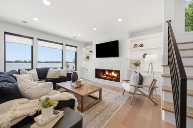 Experience exceptional lakefront living on the highly - photo 11