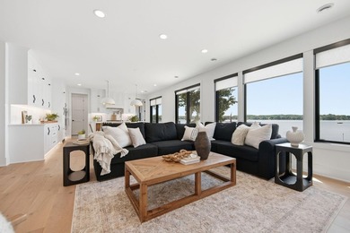 Experience exceptional lakefront living on the highly - photo 12