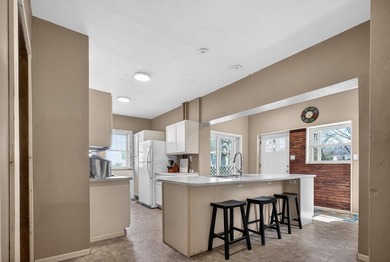 Enjoy peaceful sunrise moments on the heated front porch, then - photo 12