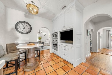 This iconic 1920's Mediterranean Revival Home blends historic - photo 14