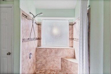 This charming 3-bedroom, 2-bath home is tucked away on a quiet