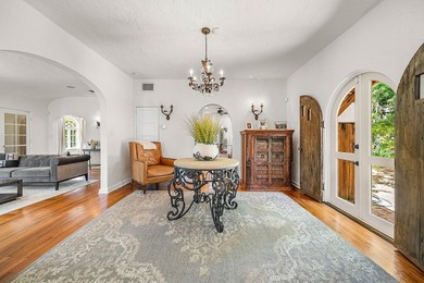 This iconic 1920's Mediterranean Revival Home blends historic - photo 18