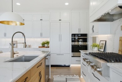 Experience exceptional lakefront living on the highly - photo 18