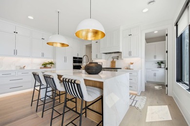 Experience exceptional lakefront living on the highly - photo 21