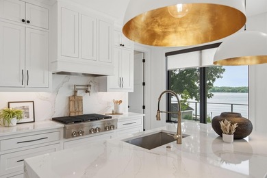 Experience exceptional lakefront living on the highly - photo 24