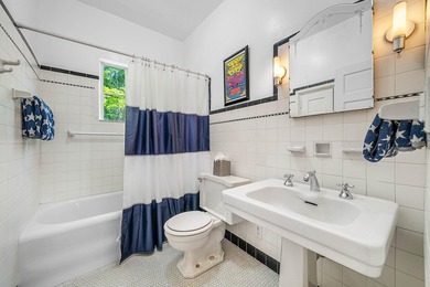 This iconic 1920's Mediterranean Revival Home blends historic - photo 27