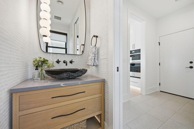 Experience exceptional lakefront living on the highly - photo 27