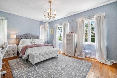 This iconic 1920's Mediterranean Revival Home blends historic - photo 28