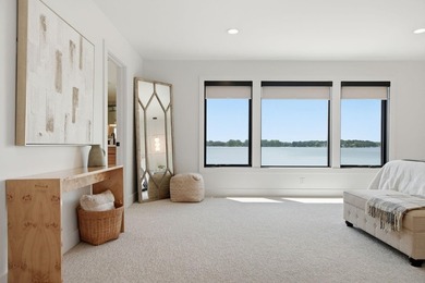 Experience exceptional lakefront living on the highly - photo 32