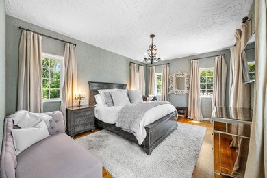 This iconic 1920's Mediterranean Revival Home blends historic - photo 33