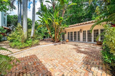 This iconic 1920's Mediterranean Revival Home blends historic - photo 45