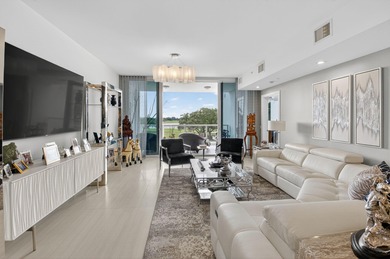 Dazzling golf and sparkling lake views await in this stunning