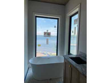 Welcome to Your Stunning New Lake Home on Highly Sought After - photo 15