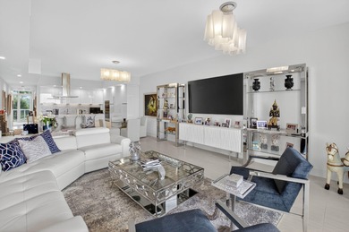 Dazzling golf and sparkling lake views await in this stunning