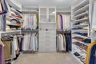 Dazzling golf and sparkling lake views await in this stunning