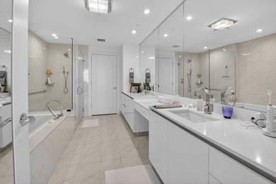 Dazzling golf and sparkling lake views await in this stunning