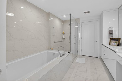 Dazzling golf and sparkling lake views await in this stunning