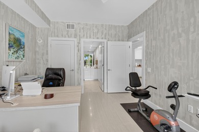 Dazzling golf and sparkling lake views await in this stunning