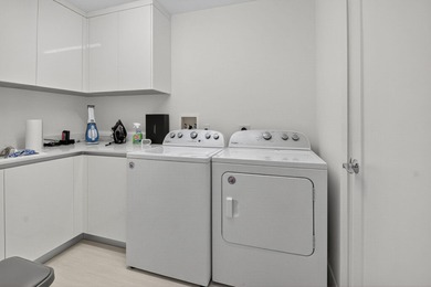 Dazzling golf and sparkling lake views await in this stunning