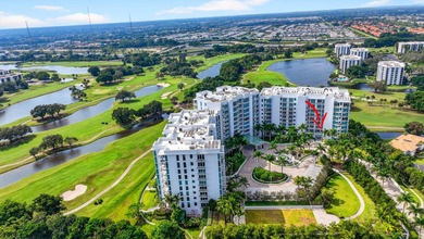 Dazzling golf and sparkling lake views await in this stunning