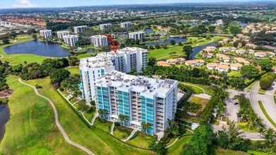 Dazzling golf and sparkling lake views await in this stunning