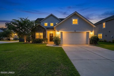 Welcome to this spacious 3-bedroom, 2.5-bath home with a 2-car - photo 1