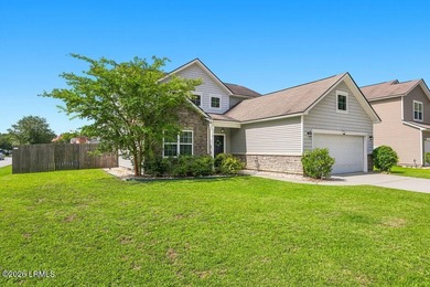 Welcome to this spacious 3-bedroom, 2.5-bath home with a 2-car - photo 3